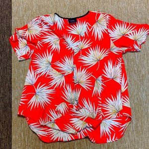 Front tie orange shirt! Wood buttons going down the front.